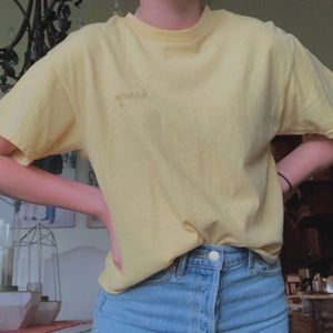 yellow top with the word honey